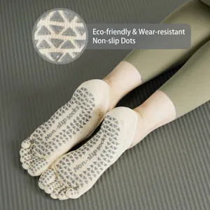 Anti-slip five-toe yoga socks for women, breathable cotton pilates socks with grip dots for indoor workout.