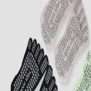Detailed view of non-slip five toe yoga socks with grip dots for pilates and fitness.