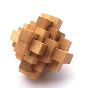 Wooden interlocking puzzle close-up, traditional Luban lock brain teaser block toy for kids.