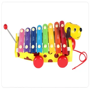 Wooden musical pull-along xylophone toy for kids, cute dog design with colorful notes.