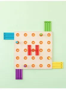 Wooden educational pegboard detail showing colorful sticks and drilled base for kids learning.