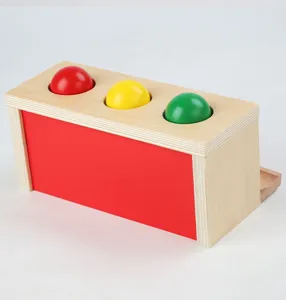 Wooden pounding ball toy for kids early education, hand and eye coordination game.
