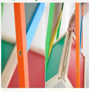 Wooden kids drawing board detail shot showing sturdy frame, colorful panels and metal hinges.