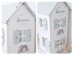 Vue détaillée de la maison de poupée en bois style nordique avec jolis décors de fenêtres.