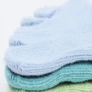 Close-up detail shot of pastel five-toe yoga socks showing soft knit texture and split design.