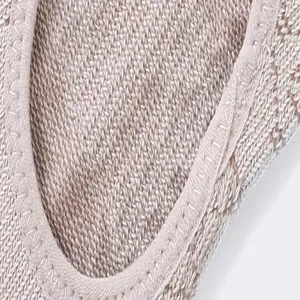 Knit yoga sock detail view, breathable and comfortable cotton fabric for fitness.