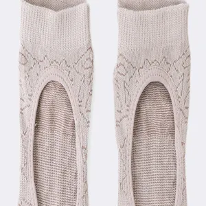 Detailed close-up of breathable knit open-back yoga socks for women fitness workout pilates.