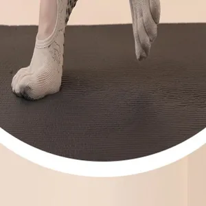 Close-up detail of women's five-toe yoga socks featuring ribbed knit and anti-slip grip.