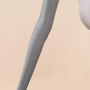 Grey yoga leggings detail view, high stretch activewear sports pants for women fitness workout.
