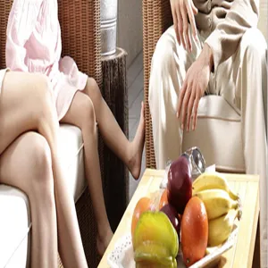 Cozy indoor lifestyle detail shot showing a wooden table with fresh fruits and seating.