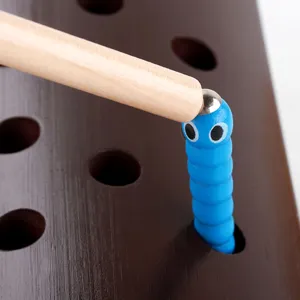 Montessori wooden magnetic catching worm game toy for kids early education hand-eye coordination.
