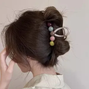 Stylish multi-color bead hair claw clip for women, elegant daily hair accessories styling.