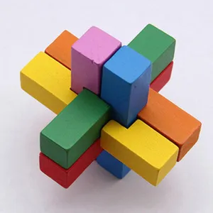 Colorful wooden interlocking brain teaser puzzle close up detail display shot item