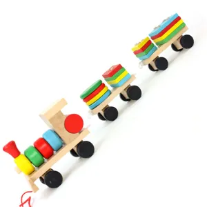 Wooden pull along shape sorting train toy with colorful geometric stacking blocks for toddlers.