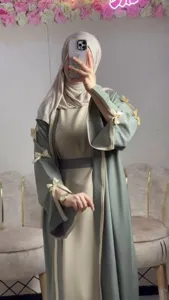 Elegant Muslim abaya cardigan set with bow sleeves, loose modest long dress for women.