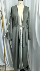 Gray long cardigan robe detail featuring white trim, waist tie belt, and cute bow sleeve accents.