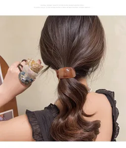 Minimalist acetate hair tie for women, elegant ponytail holder with geometric design.