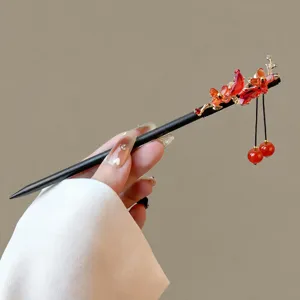 Chinese vintage wooden hairpin with red crystal flowers and tassel, elegant hair accessory.
