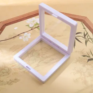 Weißer quadratischer PE-Folie schwimmender Schmuck-Display-Kasten für Ringe und Broschen.
