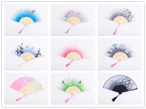 Chinese style folding silk hand fan set, vintage floral pattern with elegant tassel decor.
