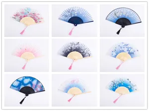 Traditional Chinese folding fans with delicate floral patterns and elegant tassels for women.