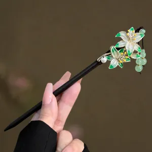 Traditional Chinese flower hair stick with green beaded tassel, elegant hair accessory for women.