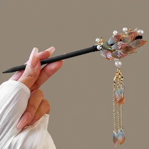 Handmade wooden hair stick with floral tassel, perfect for traditional Hanfu styling.