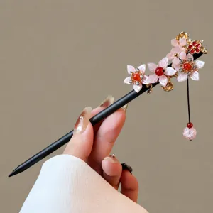 Chinese style wooden hairpin with pink flower and tassel, elegant vintage hair accessory.