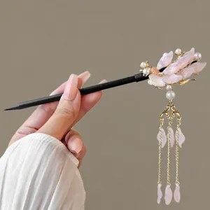 Traditional Chinese hair stick with pink floral petal tassel design and pearls for Hanfu updo.