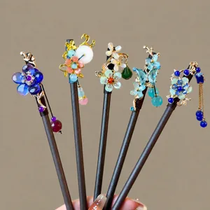 Chinese style wooden hairpin set with tassels and floral pendants for elegant hair styling.