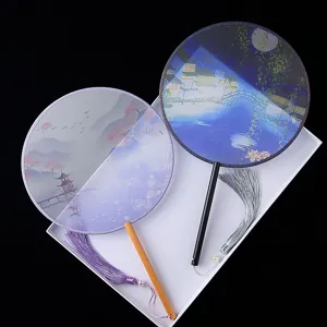 Traditional Chinese round fan set with landscape prints and tassels for Hanfu costume.