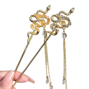 Épingle à cheveux serpent dorée style ancien chinois pampille accessoire Hanfu femme.