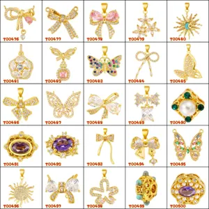 Close-up of micro-pave cubic zirconia copper pendant charms, bow butterfly DIY jewelry accessories.
