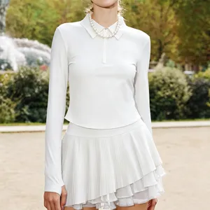 Haut polo blanc à manches longues avec jupe de tennis plissée ensemble de sport fitness