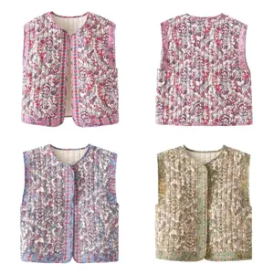Detailed view of quilted floral padded vest, featuring a stylish V-neck and ethnic print design.