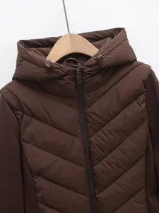 Brown quilted hooded winter jacket detail, slim fit outerwear with front zipper closure.