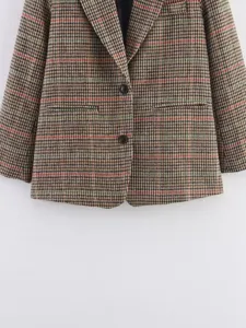 Detail view of women brown plaid wool blend casual blazer, button closure, lapel collar.