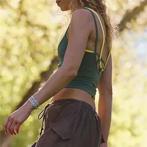 Women two-piece contrast color backless sports vest breathable yoga tank top detail.