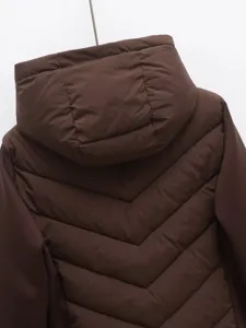 Women winter slim fit hooded quilted puffer jacket detail back view brown outdoor coat.