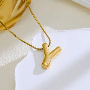 Elegant gold bubble letter Y pendant necklace with a delicate snake chain for women fashion.