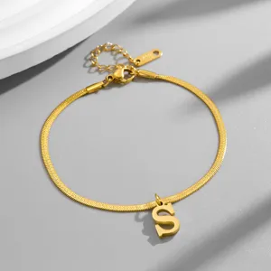 Gold stainless steel herringbone chain bracelet featuring initial letter S pendant for daily wear.