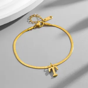 Gold stainless steel herringbone chain bracelet with initial letter T pendant and clasp detail.