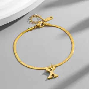 Exquisite gold titanium steel letter X snake chain bracelet for women elegant gift.