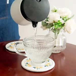 Cotton braided floral coaster for dining table, heat-resistant placemat and tea cup mat.