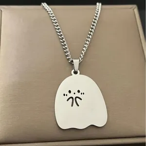Cute little ghost pendant necklace detail shot, stylish silver chain for daily wear and gifts.