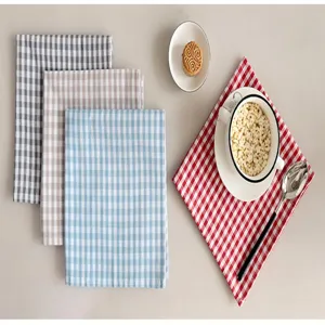 Cotton gingham kitchen towels detail, colorful square plaid tea napkins for home decor.