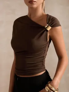 Asymmetric one-shoulder brown crop top with stylish gold metal buckle detail for women.