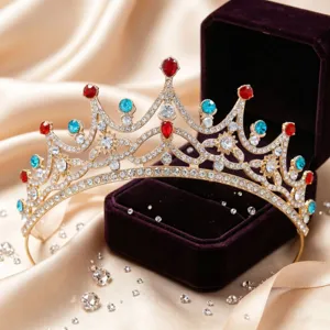 Gold crystal bridal tiara crown with red and blue rhinestones for wedding party detail view