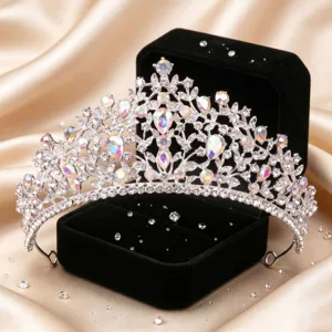 Close-up detail of luxury silver crystal rhinestone bridal tiara crown headpiece decoration.