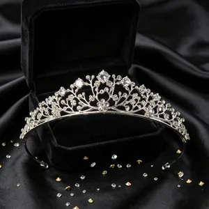 Exquisite crystal tiara detail shot, elegant silver crown headpiece for party and wedding.